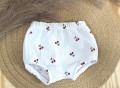 Spodenki bloomersy z muślinu – miękki materiał i elastyczny pas zapewniający wygodę noszenia Wisienki